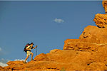 Hiker Rock Ledge Canyonlands Utah